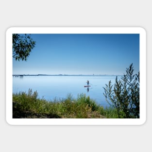 a lone board sailor in the quiet bay in the southern Öresund, on the Swedish side - SUP stand up paddle board Sticker